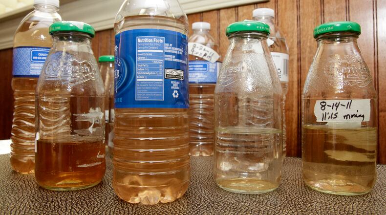 Samples of discolored tap water from a 2011 Clark County story. BARBARA J. PERENIC / STAFF FILE