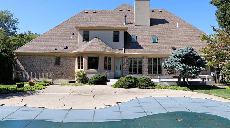Outside, the 0.78-acre property in Beavercreek has room for the play with an in-ground swimming pool. Contributed photos by Kathy Tyler