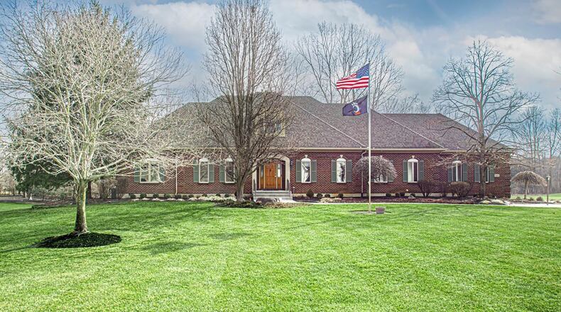 This Washington Township brick story and a half home has four bedrooms and five bathrooms and has a finished walk out basement.