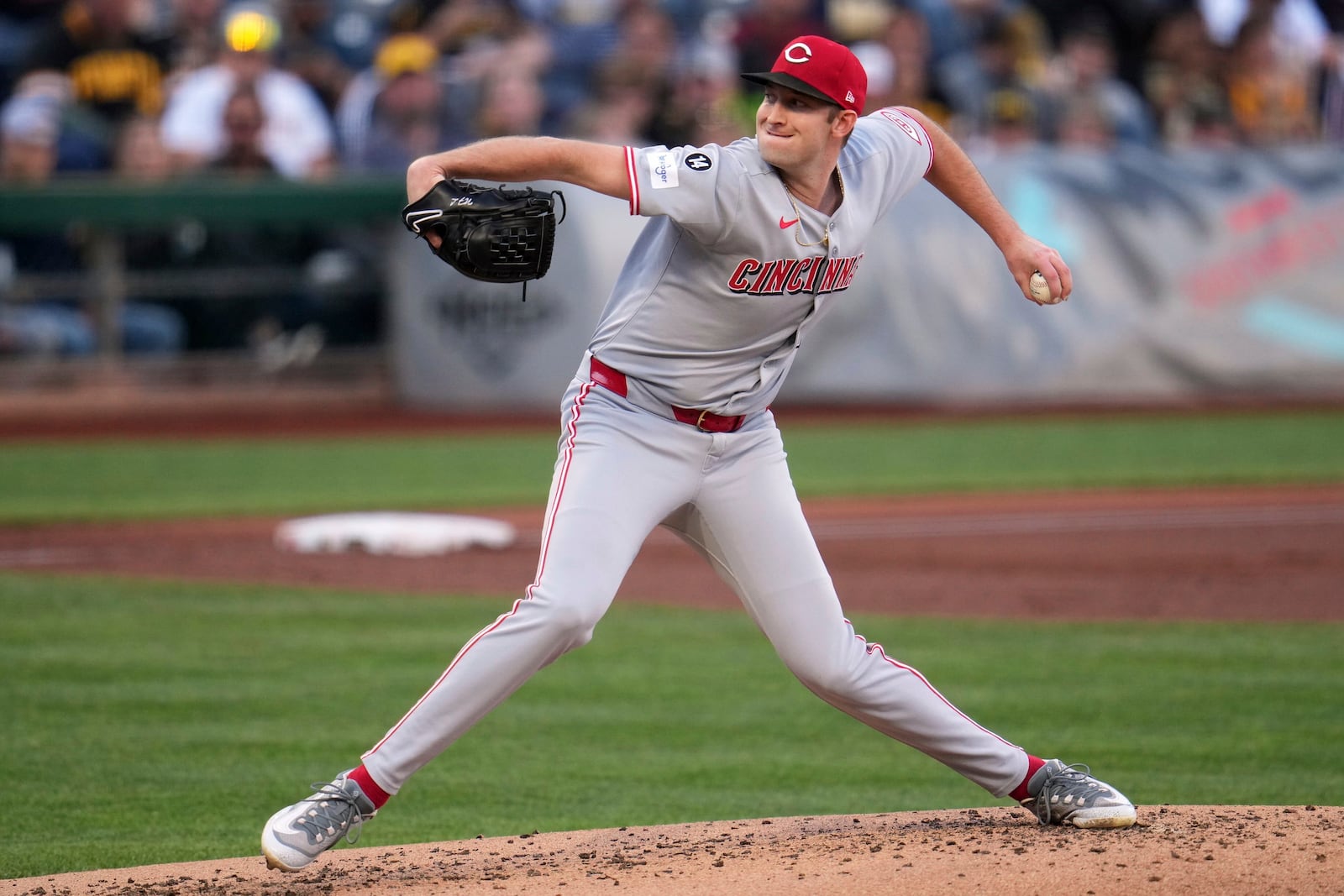 Cincinnati Reds pitcher Nick Lodolo delivers during the first inning of a baseball game against the Pittsburgh Pirates in Pittsburgh, Monday, May 19, 2025. (AP Photo/Gene J. Puskar)