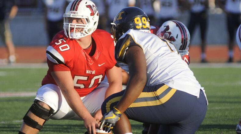 Wayne senior center Ben Jackson (left) will play on the South Divisions I-III team. MARC PENDLETON / STAFF