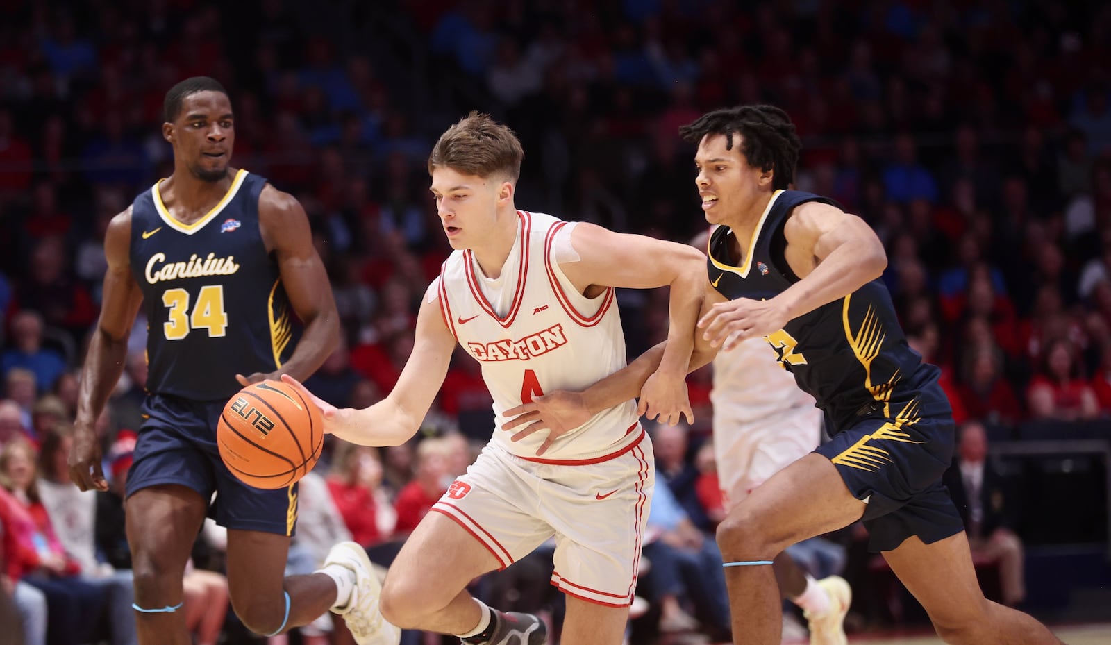 Dayton's Jordan Derkack dribbles against Canisius on Monday, Nov. 3, 2025, at UD Arena. David Jablonski/Staff