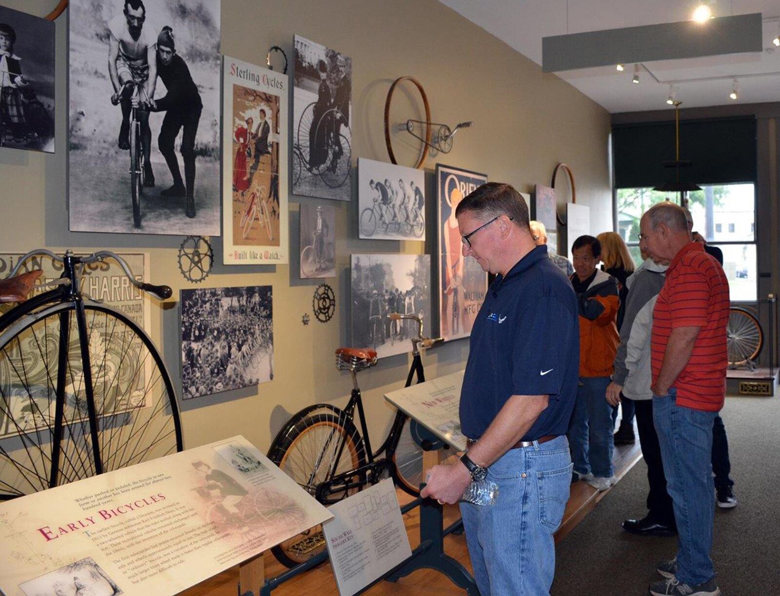 Col. Charles Ormsby, acting director, Air Force Research Laboratory Materials and Manufacturing Directorate, views displays at the site of the original Wright Brothers’ Bicycle Shop in downtown Dayton Sept. 13. Ormsby accompanied a group of military and civilian scientists, staff and engineers from the directorate on a visit to significant aviation history sites across Dayton during an Aviation Heritage Tour to gain a better understanding of the evolution of innovation in Dayton, the legacy of which the AFRL carries on today. (U.S. Air Force photo/Marisa Alia-Novobilski)