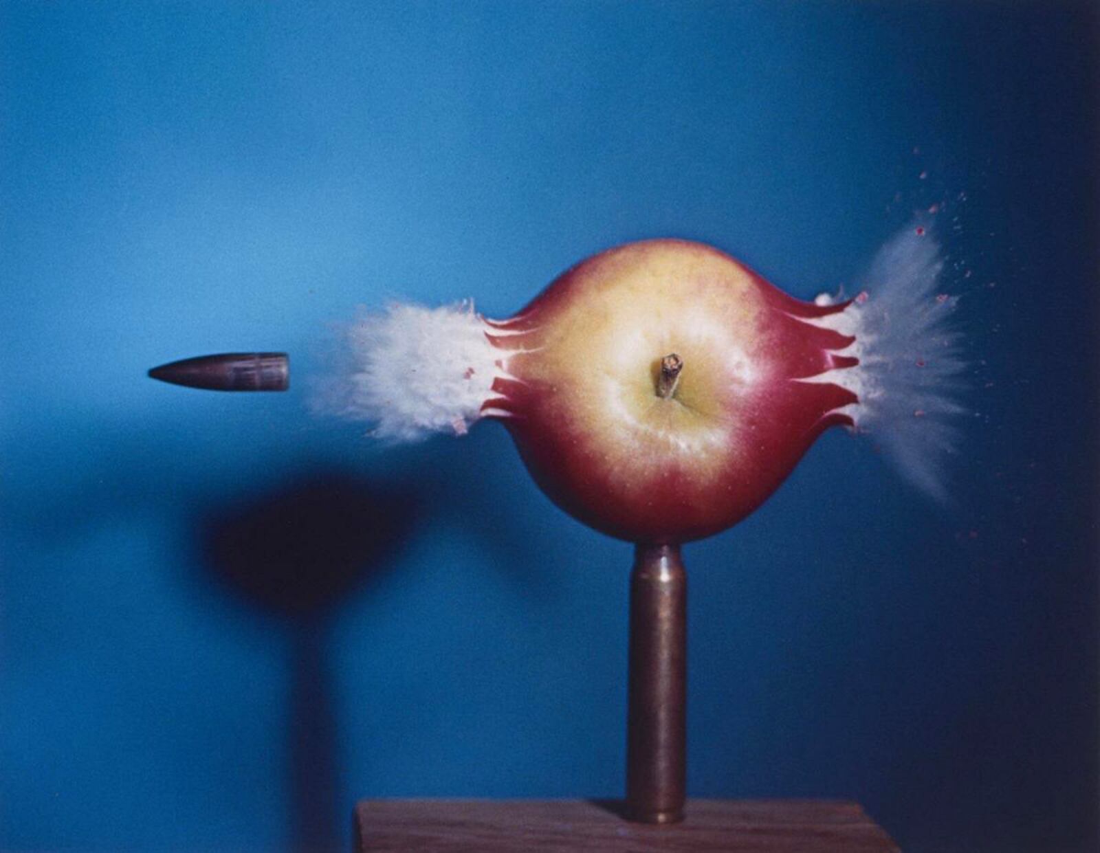 Dr. Harold Edgerton (American, 1903–1990), .30 BULLET PIERCING AN APPLE, 1964, Dye transfer print, edition 142/150. Gift of the Harold and Esther Edgerton Family Foundation, 1996.201.6