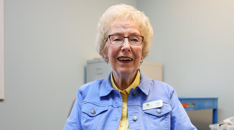 Lois Wiggin has been named a Dayton Daily News Community Gem for her work at Health Partners Free Clinic in Troy. BRYANT BILLING / STAFF