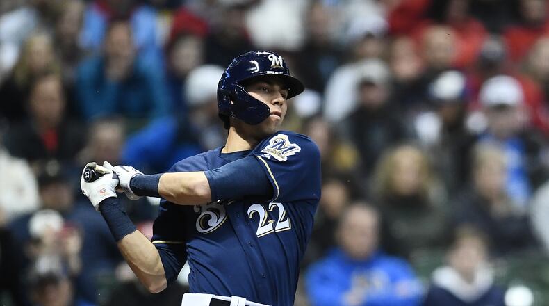 MILWAUKEE, WISCONSIN - MARCH 30: Christian Yelich #22 of the Milwaukee Brewers swings at a pitch during the eighth inning of a game against the St. Louis Cardinals at Miller Park on March 30, 2019 in Milwaukee, Wisconsin. (Photo by Stacy Revere/Getty Images)