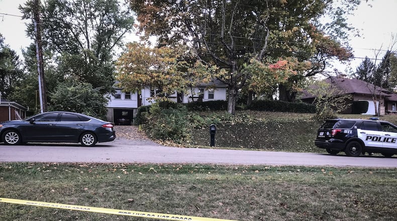 The bodies of two men were removed Sept. 29, 2020, from a home on Roselawn Drive in Beavercreek.