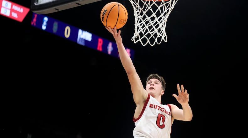 Rutgers guard Jordan Derkack (0) shoots during the first half of an NCAA college basketball game against Notre Dame, Tuesday, Nov. 26, 2024, in Las Vegas. (AP Photo/Ian Maule)