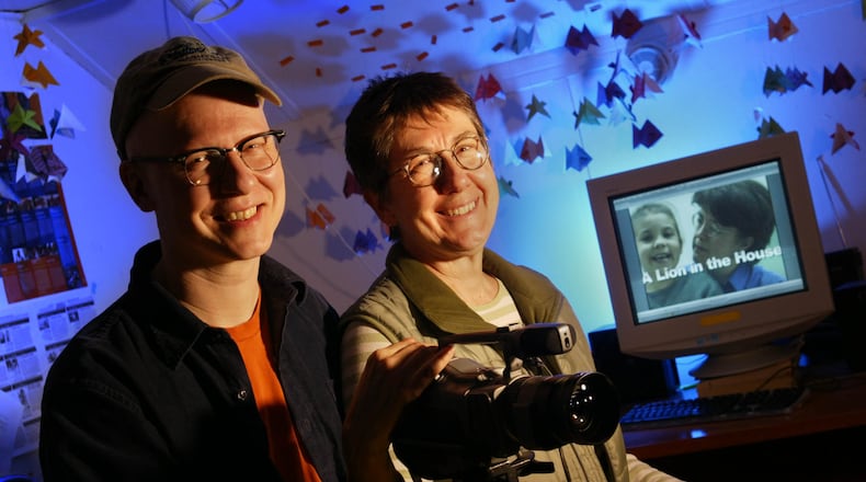 Yellow Springs filmakers Steven Bognar and Julia Reichert pictured in this 2006 archive photo. Their 2006 documentary film "A Lion in the House" will be featured on Neflix.  LISA POWELL / STAFF