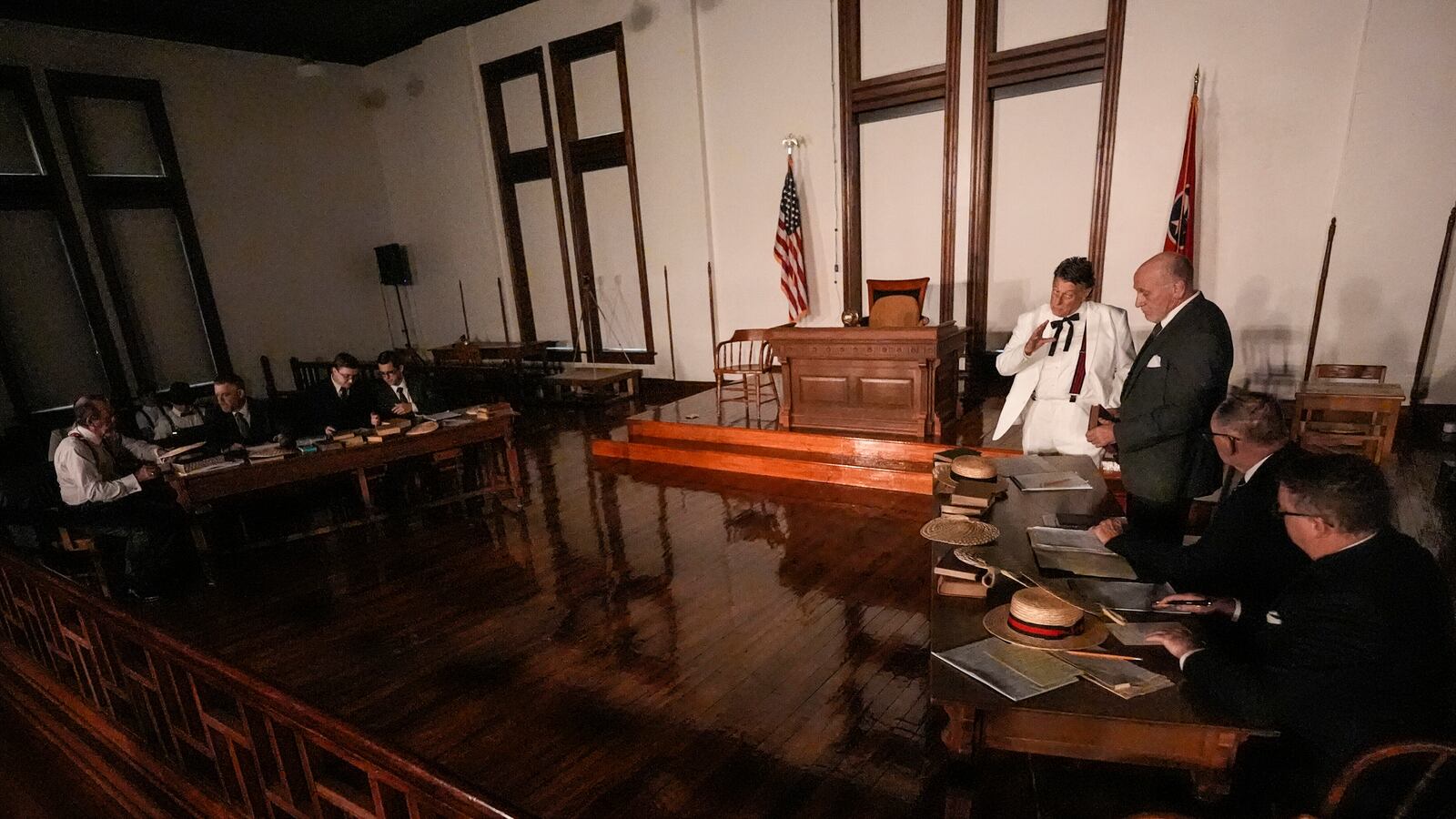 Larry Jones, who portrays William Jennings Bryan, in white suit, rehearses with other actors in the play "Destiny in Dayton", July 8, 2025, in Dayton, Tenn. (AP Photo/Mike Stewart)
