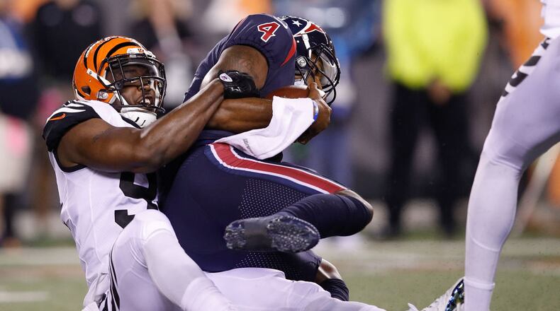 CINCINNATI, OH - SEPTEMBER 14: Chris Smith #94 of the Cincinnati Bengals sacks Deshaun Watson #4 of the Houston Texans during the first half at Paul Brown Stadium on September 14, 2017 in Cincinnati, Ohio. (Photo by Joe Robbins/Getty Images)