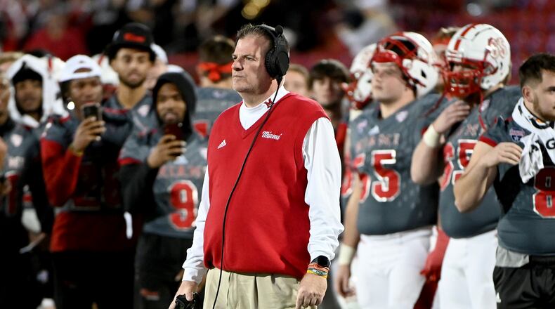 Miami (Ohio) coach Chuck Martin stands along the sideline during the second half of the team's Frisco Football Classic NCAA college football game against North Texas in Frisco, Texas, Thursday, Dec. 23, 2021. (AP Photo/Matt Strasen)