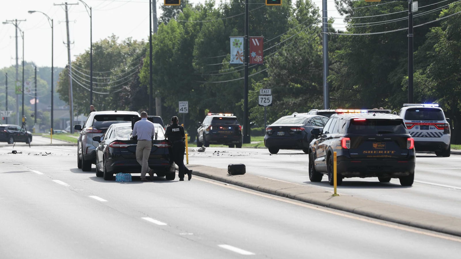 A stolen vehicle connected to a home invasion in Kentucky fled from Springboro police, resulting in a chase and crash at Ohio 725 and Paragon Road in Washington Twp. on Monday, Aug. 11, 2025. A female was taken into custody at the scene and a man was arrested on Paragon Road following a large police presence and shelter in place advisory. BRYANT BILLING / STAFF