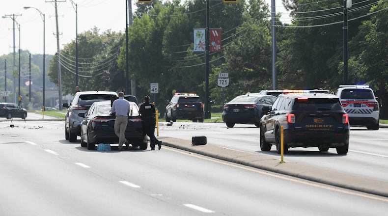 A stolen minivan connected to a home invasion in Kentucky fled from Springboro police Monday, Aug. 1, 2025. This led to a pursuit that ended in a crash at Ohio 725 and Paragon Road in Washington Twp., Montgomery County. A female was taken into custody at the scene and a man was later found in an area storm drain. BRYANT BILLING / STAFF