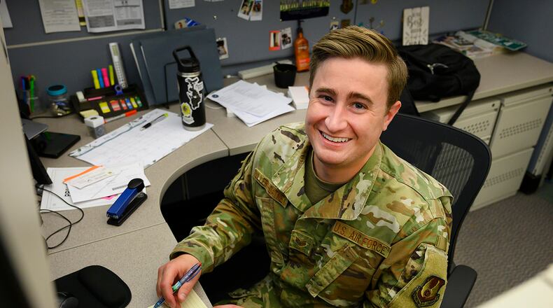 Staff Sgt. Hayden Ullery-Oatney, occupational safety apprentice, is pictured at his desk June 22 in the 88th Air Base Wing’s Safety Office at Wright-Patterson Air Force Base. Ullery-Oatney, who came out as gay at his first assignment in 2013, said he is seeing progress for the LGBTQ community serving in the Air Force. U.S. AIR FORCE PHOTO/R.J. ORIEZ