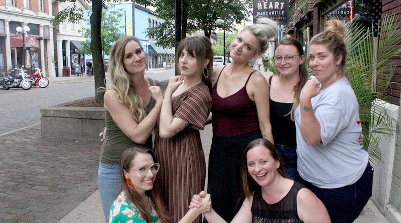 A group of women who have dubbed themselves the Ratchet Red Cross disseminated information about tornado victims in need to the public, organized volunteers, collected donations and made scores of car, van and truck loads of supplies to churches, fire stations, homes and makeshift donation spots set up in Pippin s Market in Trotwood and Sunny Arces in Harrison Twp. Pictured top left to right: Carly Barret, Kait Gilcher, Brittany Smith, Tara Michel and Shana Lloyd. Bottom: Sabrina Cox and Libby Ballengee. Photo: Amelia Robinson
