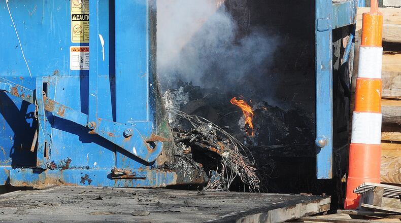 Dayton firefighters responded to a fire Friday afternoon, Jan. 22, 2021, near Ludlow and Fifth streets in downtown Dayton Friday afternoon. Officials said no one was injured in the blaze and the building, which is being renovated, was not damaged. Officials believe discarded smoking material in a dumpster started the fire.
