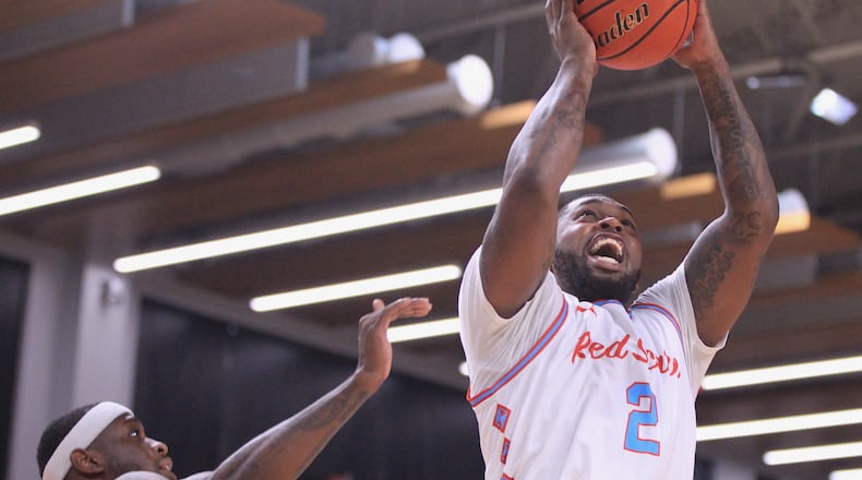 Trey Landers, of Red Scare, shoots against Category 5 in the second round of The Basketball Tournament on Sunday, July 25, 2021, at the Covelli Center in Columbus. David Jablonski/Staff
