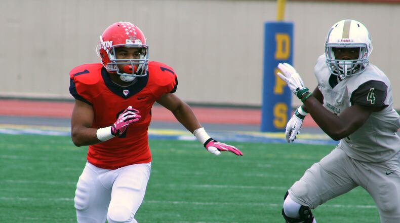 Dayton Flyers defensive back Christian Searles closes on a Jacksonville receiver at Welcome Stadium. Mike Hartsock/STAFF