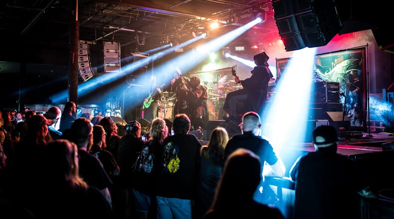 The Lurking Corpses, which is a part of the first annual Halfway to Halloween Fest: a one-night horror rock spectacle packed with live music, killer vendors, and all the spooky fun you can handle that brings the spirit of October to spring. The gloriously over-the-top horror celebration is April 26 at Yellow Cab Tavern. Photo credit: The Lurking Corpses