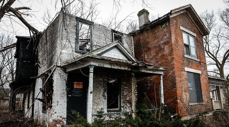 Montgomery County Land Bank will receive millions to demolish blight such as this property at 2030 East Fourth Street. JIM NOELKER/STAFF