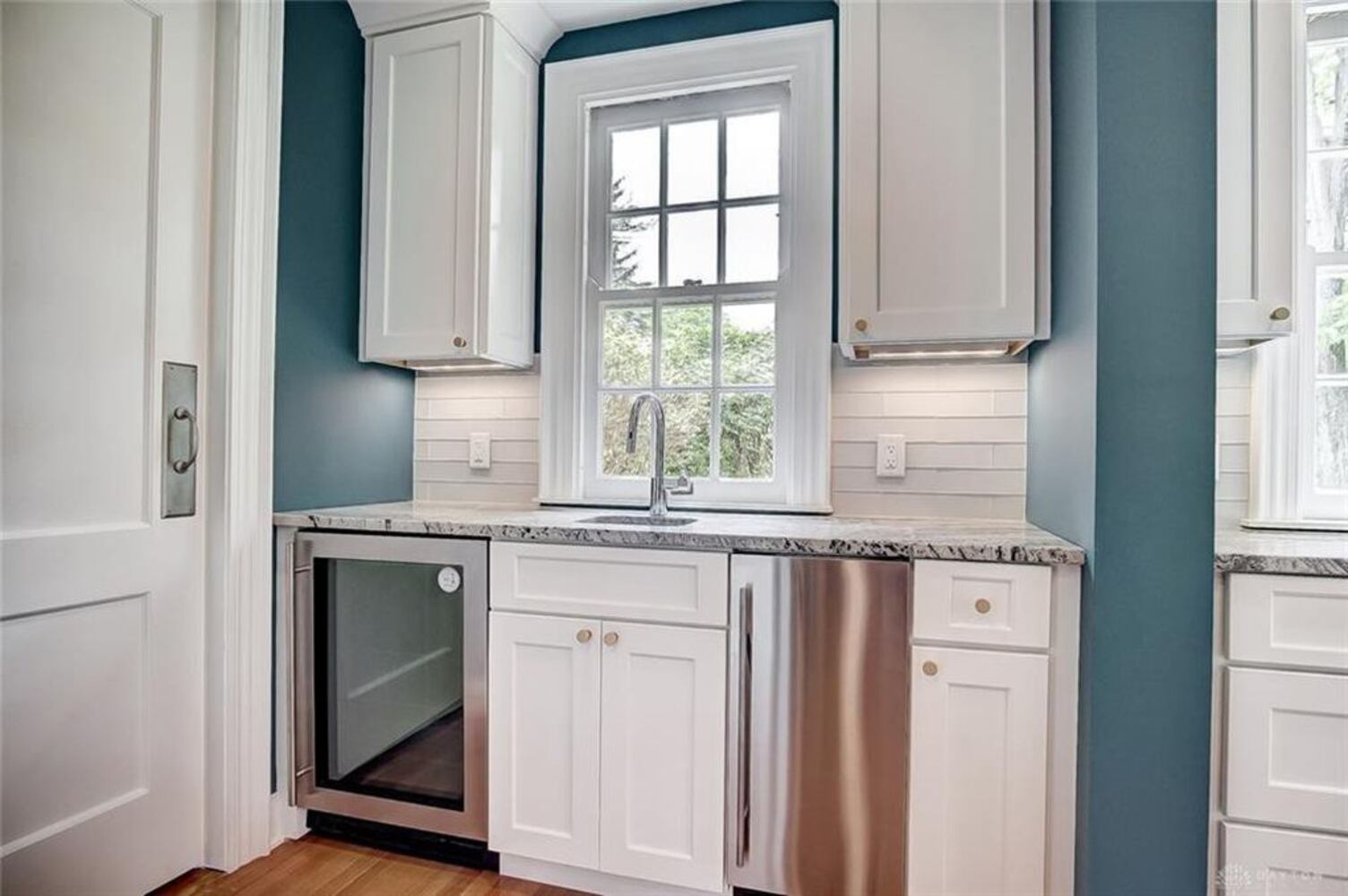 PHOTOS: Luxury, renovated Oakwood Tudor home on market for nearly $1.2M