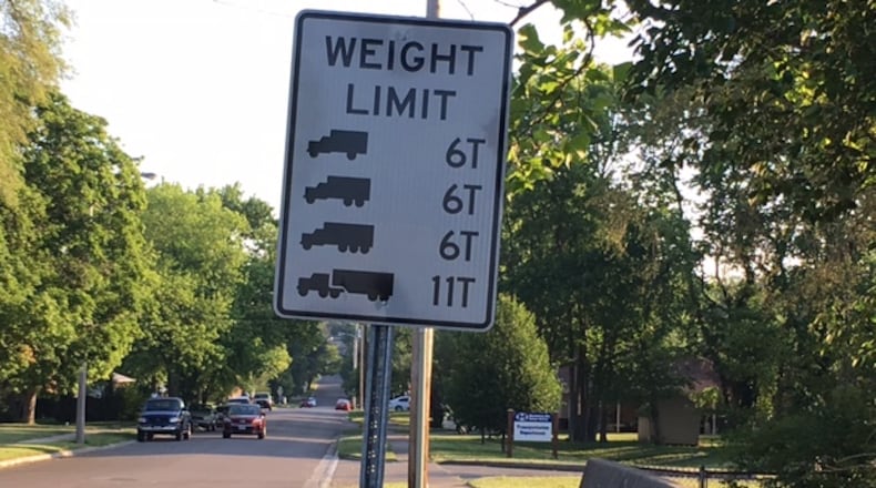 This sign for the Twelfth Street bridge in Miamisburg shows its weight limits prior to renovation. NICK BLIZZARD/STAFF PHOTO