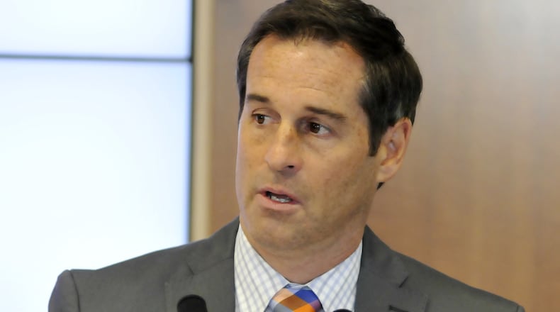FC Cincinnati head coach John Harkes talks about the first wave of players announced on Monday afternoon, Dec. 7, 2015, in downtown Cincinnati. MICHAEL D. PITMAN/STAFF FILE