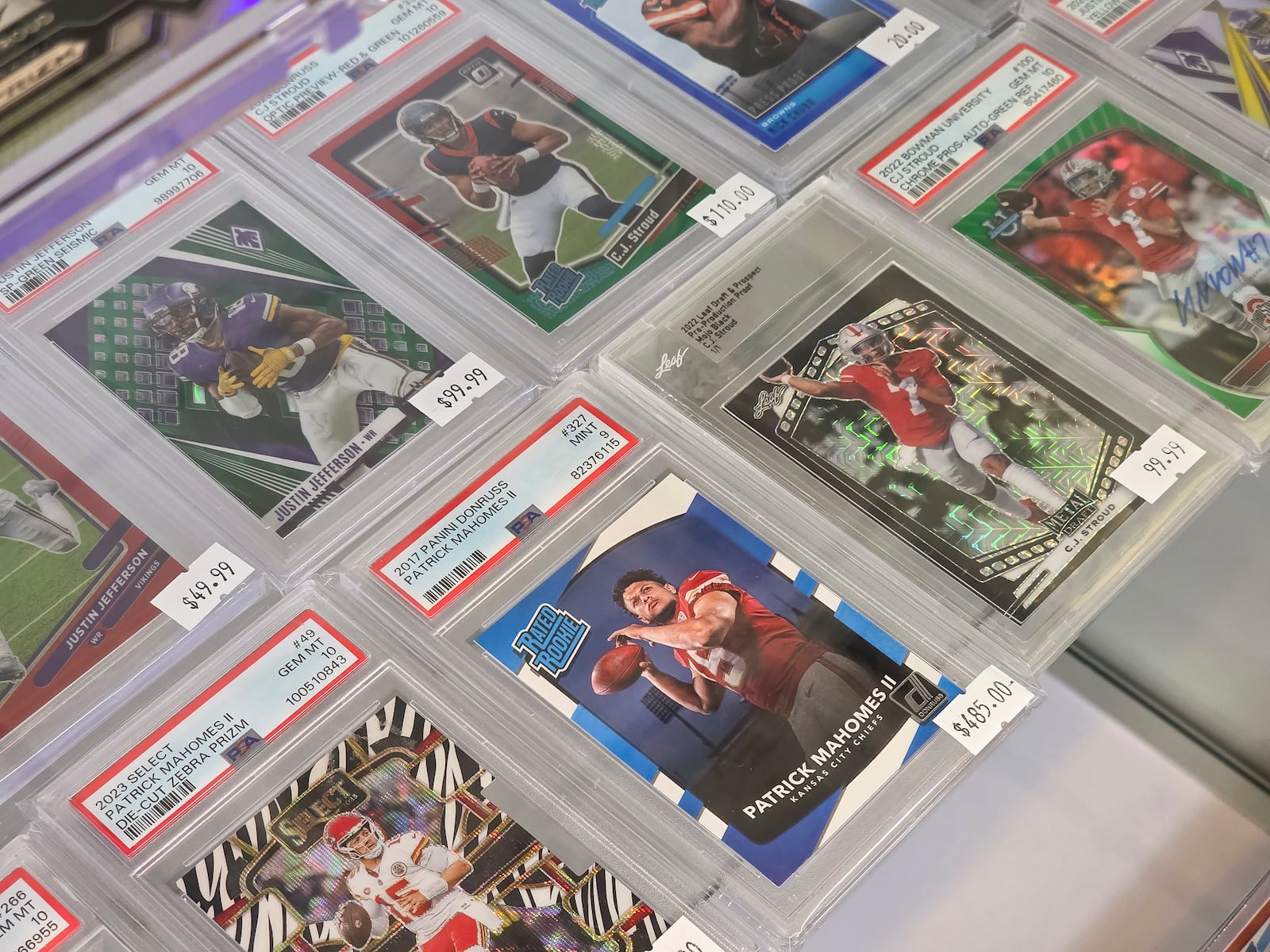 Slabbed Sports Cards on Tylers Place Blvd. in West Chester Township has a variety of sports and other trading cards and new card packs available for purchase in the store. NICK GRAHAM/STAFF