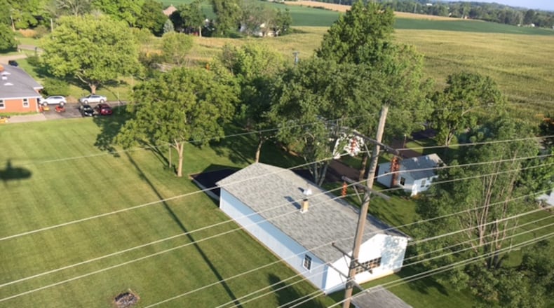 A shot during a Dayton Power & Light helicopter inspection in August 2016 of area power lines. THOMAS GNAU/STAFF