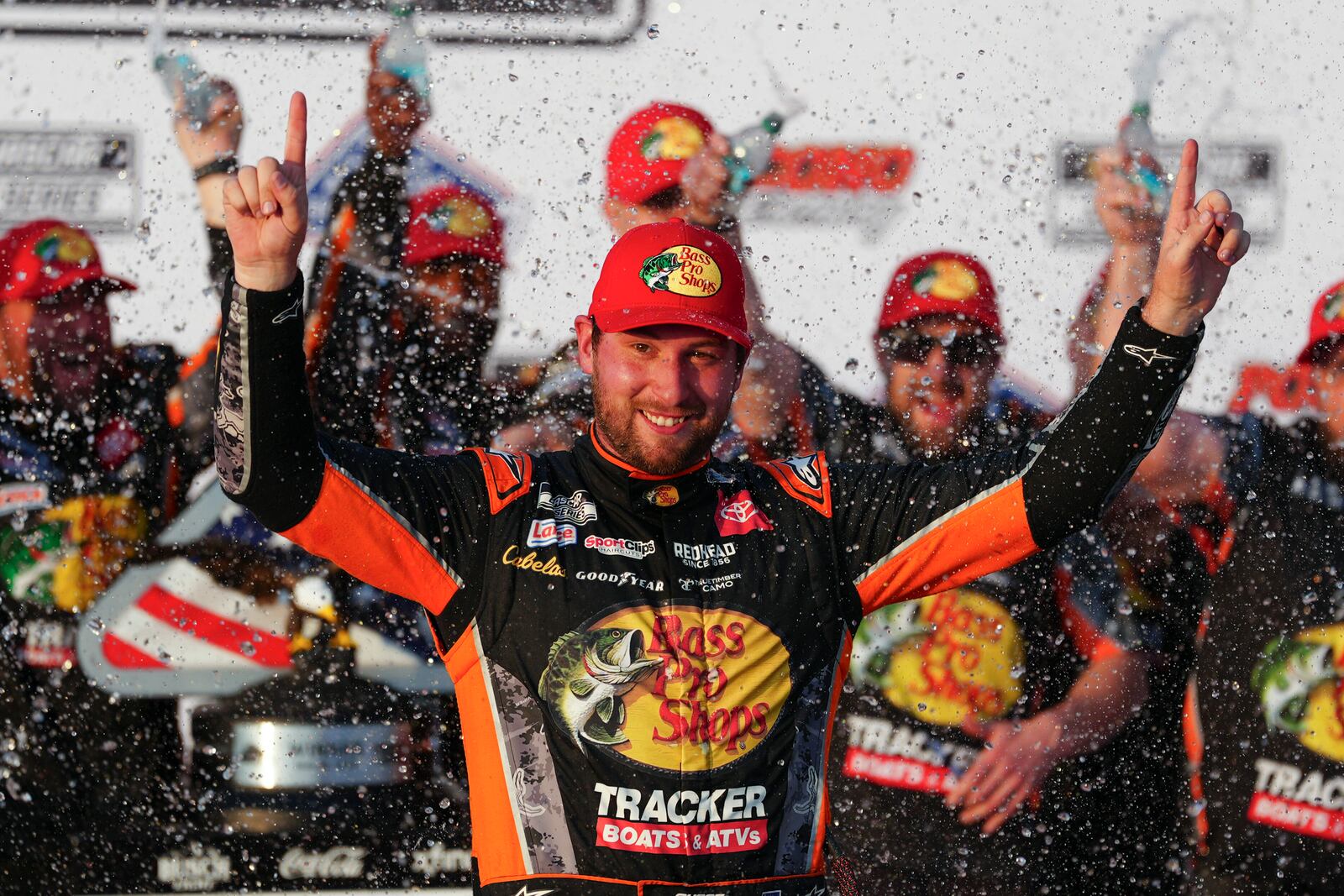 Chase Briscoe celebrates in Victory Lane after winning a NASCAR Cup Series auto race at Pocono Raceway, Sunday, June 22, 2025, in Long Pond, Pa. (AP Photo/Derik Hamilton)