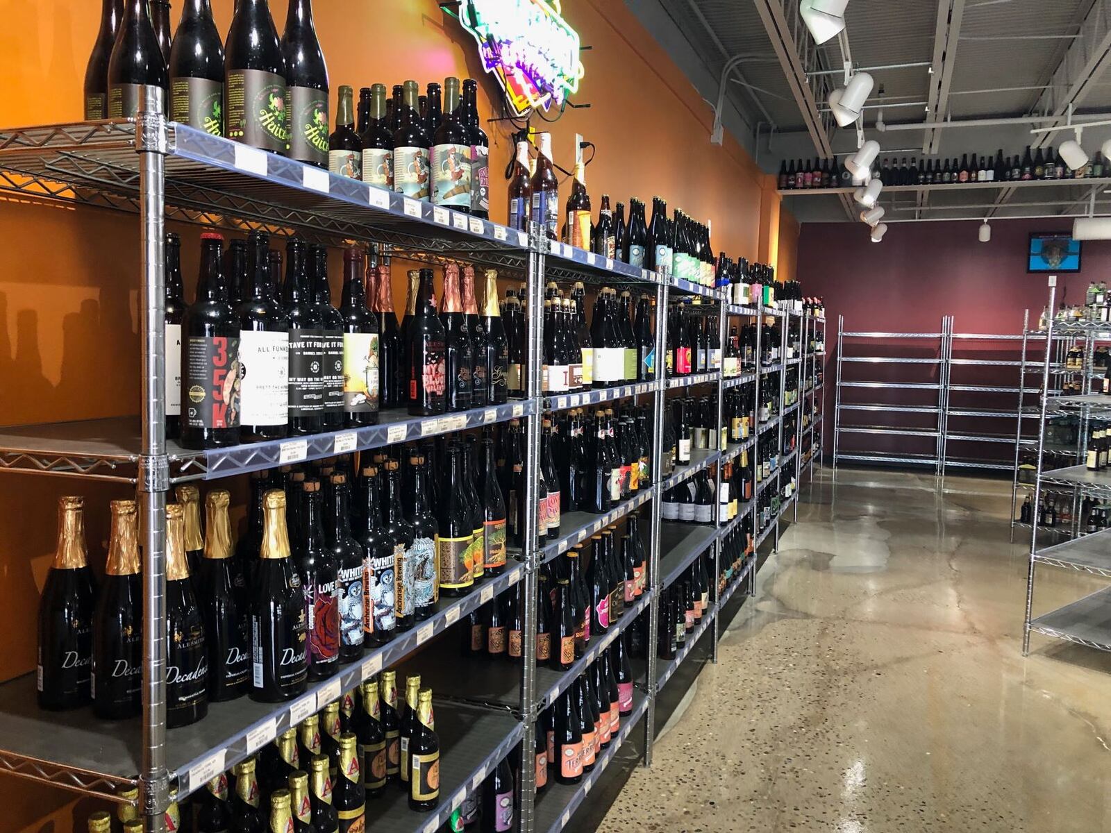 Ollie's Place is offering 50 percent off wine and beer in its retail store.