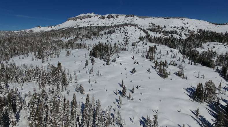 Castle Peak is shown in an aerial view on Friday, Feb. 20, 2026, near Soda Springs, Calif. (AP Photo/Godofredo A. Vásquez)