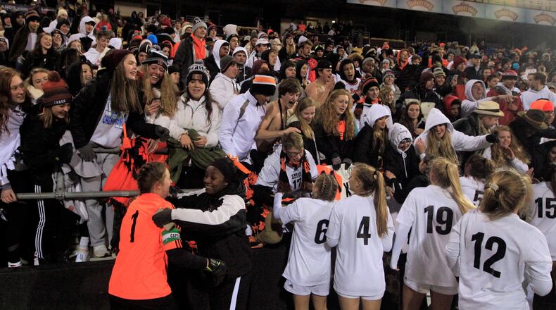 Beavercreek celebrates after a victory against Strongsville in the Division I state soccer championship on Friday, Nov. 9, 2018, at MAPFRE Stadium in Columbus. David Jablonski/Staff