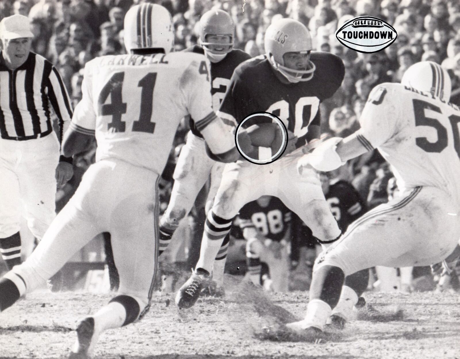 The Cincinnati Bengals Jess Phillips goes in for a touch down against the Boston Patriots at Nippert Stadium in 1969. DAYTON DAILY NEWS ARCHIVE