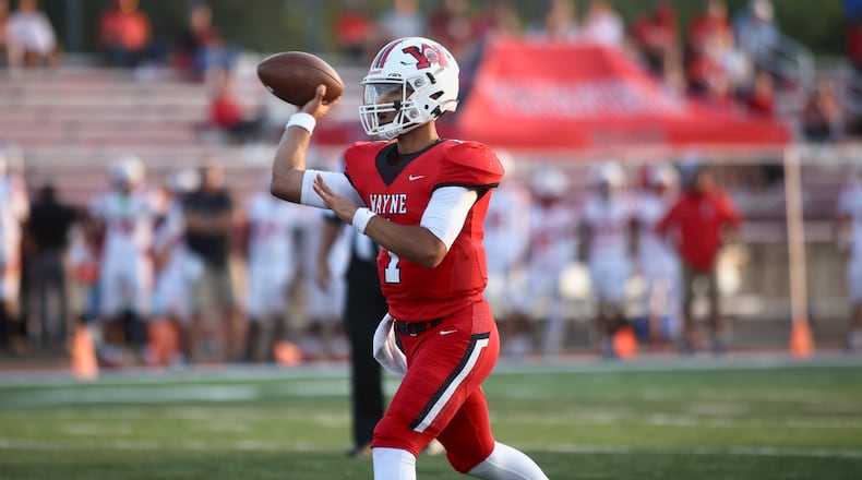 Wayne's Tyrell Lewis throws a pass against Fairfield on Friday, Aug.18, 2023, at Heidkamp Stadium in Huber Heights. David Jablonski/Staff