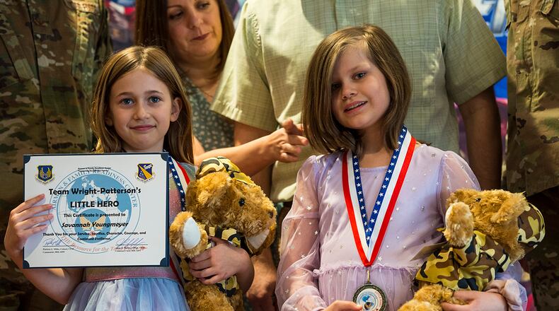 Wright-Patterson Air Force Base celebrates the children of deployed parents during its “Little Heroes” event April 8. Each child received a medallion, stuffed bear and certificate. U.S. AIR FORCE PHOTO/JAIMA FOGG