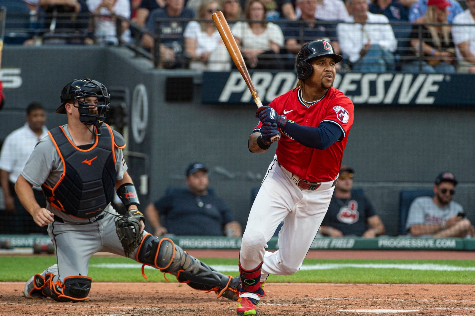 Cleveland Guardians' Jose Ramirez, right, watches his single off Detroit Tigers starting pitcher Casey Mize along with catcher Jake Rogers, left, during the fourth inning of a baseball game, Saturday, July 5, 2025, in Cleveland. (AP Photo/Phil Long)