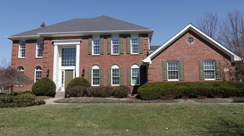 The brick 2-story with 4 bedrooms has about 4,540 sq. ft. of living space and a finished basement with office, recreation room, full bathroom and possible fifth bedroom. CONTRIBUTED PHOTO BY KATHY TYLER