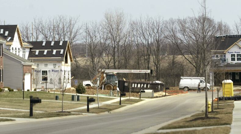 Construction on homes in Spring Meadows, a Ryan Homes development in Beavercreek, in 2011. FILE.