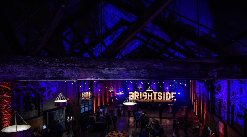 The Brightside Music and Event Venue held its grand opening on Friday, Oct. 12. After more than a year of elbow grease, owners Carli and Hamilton Dixon are “ecstatic.” The couple purchased the vacant building 10 years ago because they felt Dayton was losing industry and people. TOM GILLIAM / CONTRIBUTING PHOTOGRAPHER