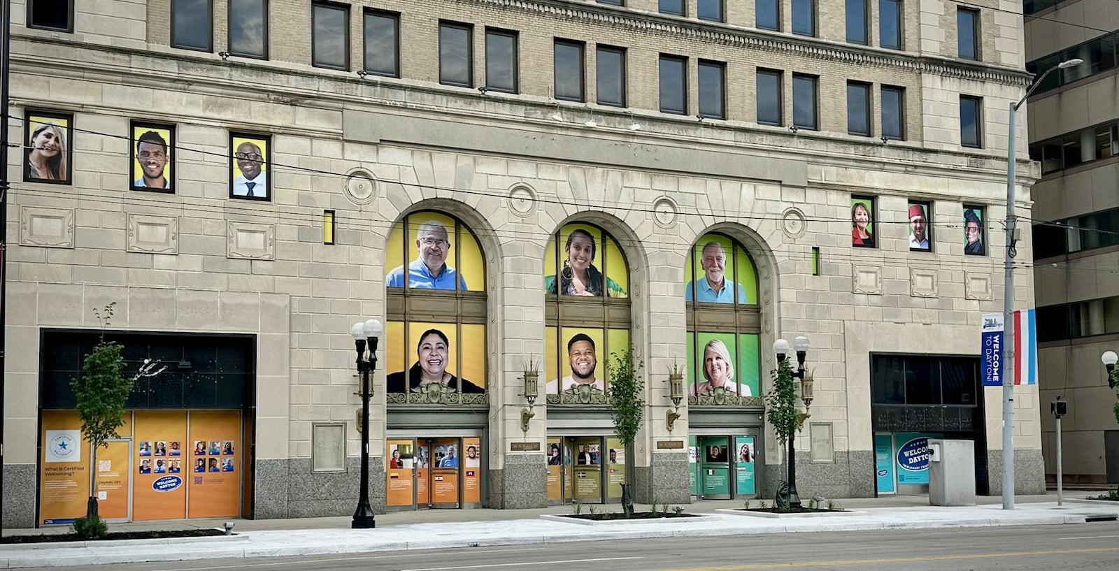 Dayton’s immigrant and refugee community is highlighted on the 34 N. Main Street building downtown across from Courthouse Square. CONTRIBUTED