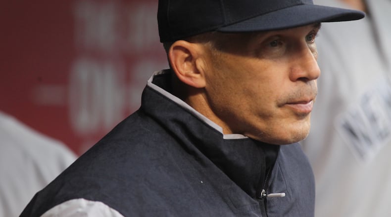 Yankees manager Joe Girardi watches a game against the Reds on Tuesday, May 9, 2017, at Great American Ball Park in Cincinnati. David Jablonski/Staff