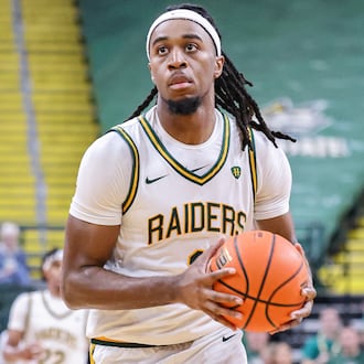 Wright State senior forward Bryan Etumnu shoots during an 86-37 win over Franklin College 86-37 in a season opener on Monday, Nov. 3 at Ervin J. Nutter Center in Fairborn. BRYANT BILLING/STAFF