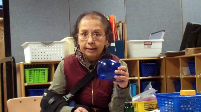 Bhanu Raghavan, an occupational therapist for Centerville City Schools, is creating videos for preschool teachers to share with their students and families. Here she is demonstrating finger strengthening activities that can be done using items around the house. CONTRIBUTED PHOTO