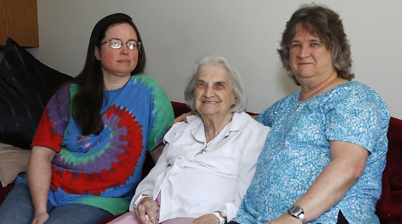 Jeanette Acker, center, with her granddaughter Jennifer Martin, left, and daughter Pat Acker, right, pictured in a family photo from 2019, before the pandemic.