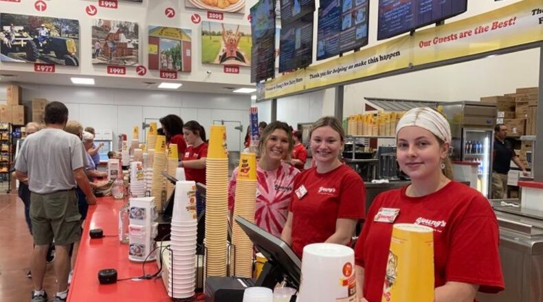 A steady stream of early customers began at 10 a.m. on Aug. 26 inside the new Young's Jersey Dairy facility situated directly behind what has been the dairy barn just outside of Yellow Springs since 1968.