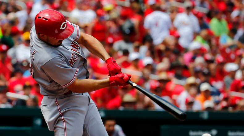 ST. LOUIS, MO - JULY 15:  Adam Duvall #23 of the Cincinnati Reds hits a two-run single against the St. Louis Cardinals in the fourth inning at Busch Stadium on July 15, 2018 in St. Louis, Missouri.  (Photo by Dilip Vishwanat/Getty Images)