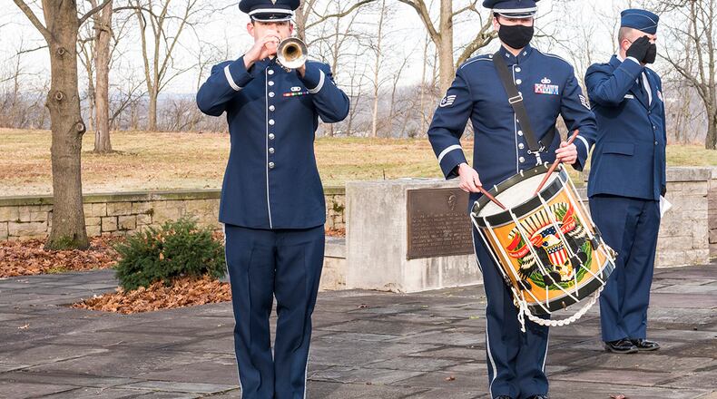Airman 1st Class James Nufer (trumpet) and Staff Sgt. Chris Hanson (drum) of the U.S. Air Force Band of Flight perform the national anthem at the 118th First Flight anniversary Dec. 17. U.S. AIR FORCE PHOTO/JAIMA FOGG