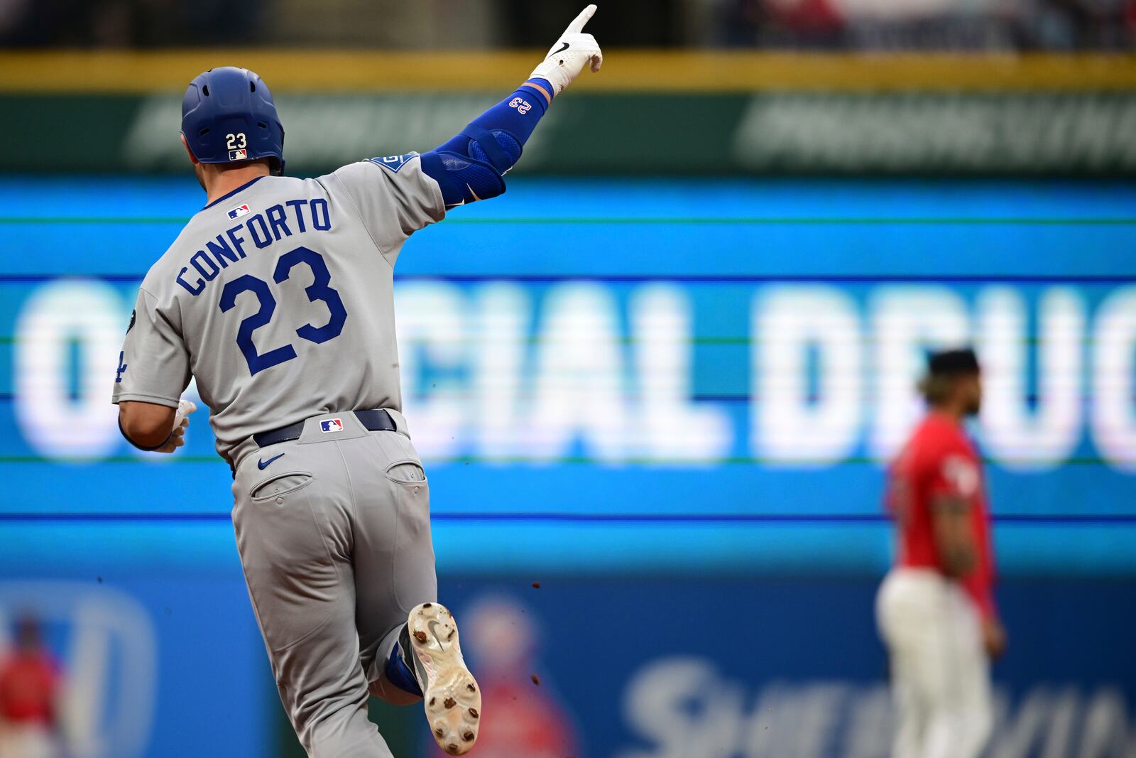 Los Angeles Dodgers' Michael Conforto runs the bases after hitting a solo home run off Cleveland Guardians relief pitcher Hunter Gaddis during the sixth inning of a baseball game, Tuesday, May 27, 2025, in Cleveland. (AP Photo/David Dermer)